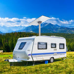 Load image into Gallery viewer, Mountain camping RV using Starlink Standard Pipe Adapter – A motorhome in a grassy mountain field, fitted with a Starlink dish and Starlink Standard Pipe Adapter to stay connected in remote areas.