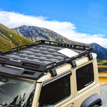 Load image into Gallery viewer, Starlink Mini Roof Rack Mount on an off-road vehicle roof platform, providing stable support for the Starlink Mini Dishy satellite connection
